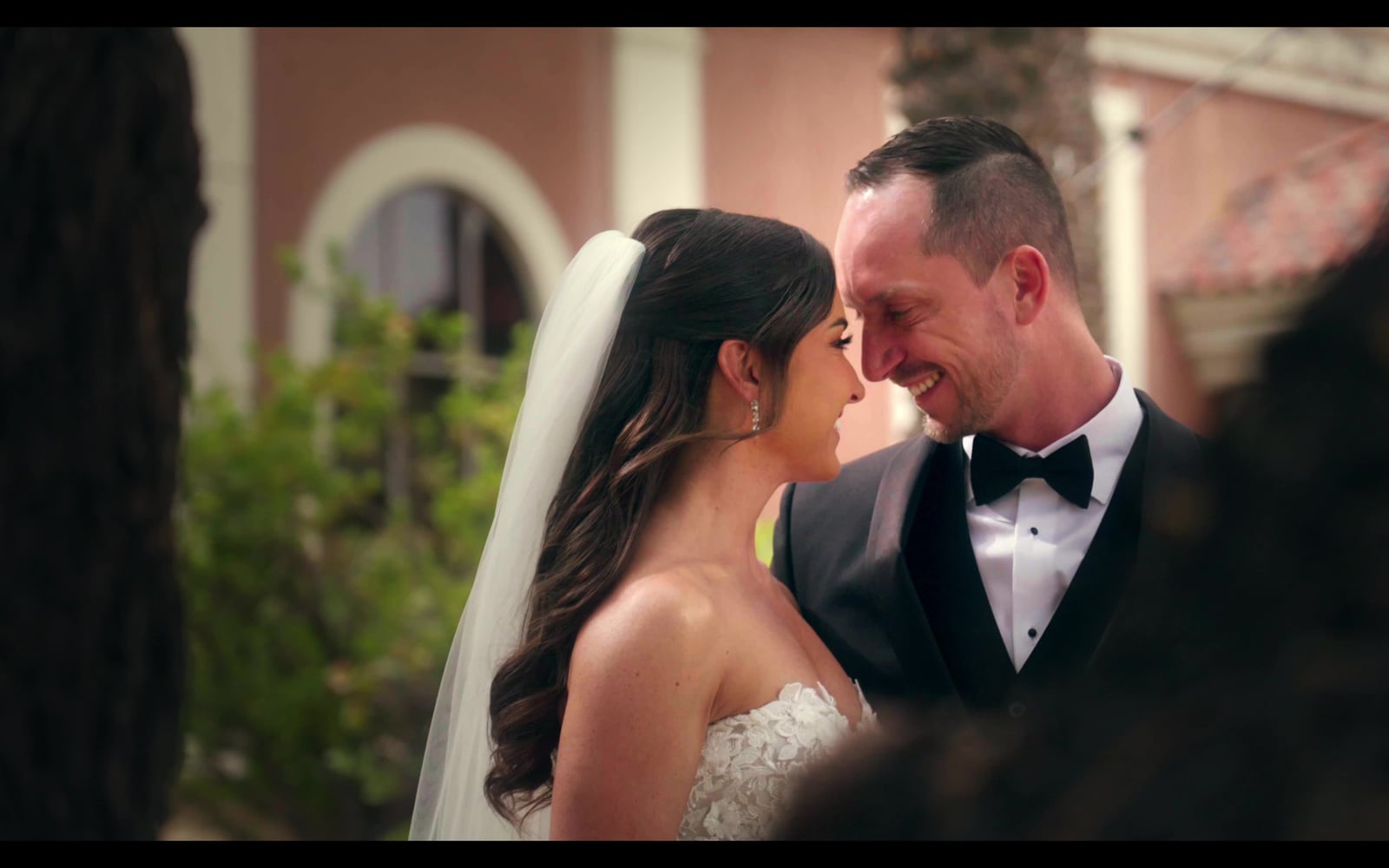 Bride and groom sharing a quiet moment on their wedding day